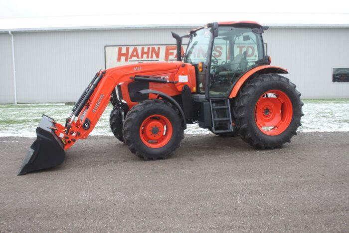 Kubota M135 GX 4wd tractor, cab, air, New M52 loader, 4 remotes, 460/85R-38, powershift.