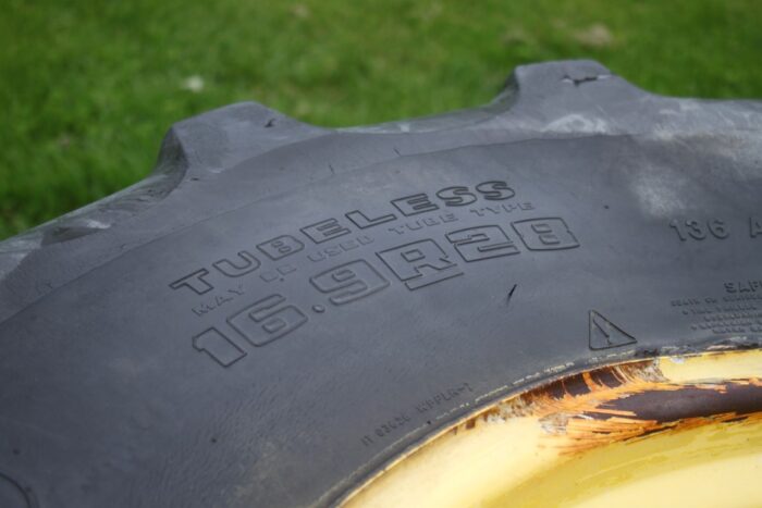 Set of 16.9x28 tires and rims - Image 6