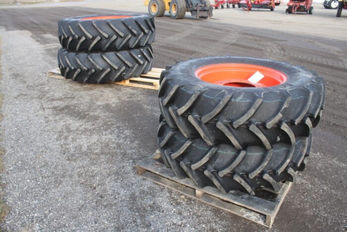 NEW Kubota M7 tires and wheel assemblies. (Set of 4)