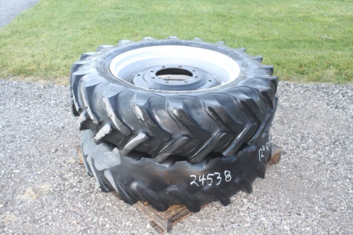 pair of 12.4R28 tires and rims, 8 bolt, 8 3/4 pilot, 11" bolt circle, silver
