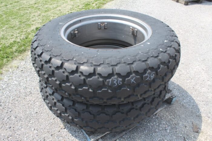 Firestone 13.6x28 turf tires on rims