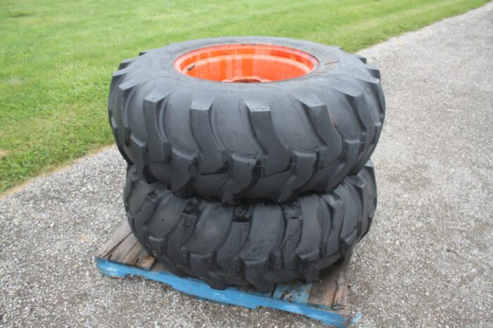 Titan set of 2 16.9-24 industrial tires on 8 bolt rims