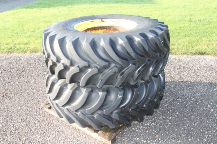 Firestone set of 2 16.9x24 tires on 8 bolt rims