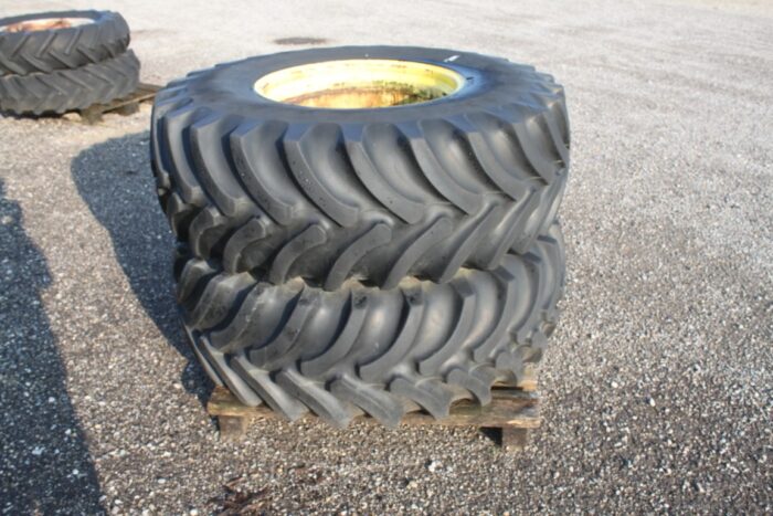 Firestone set of 2 16.9x24 tires on 8 bolt rims - Image 2