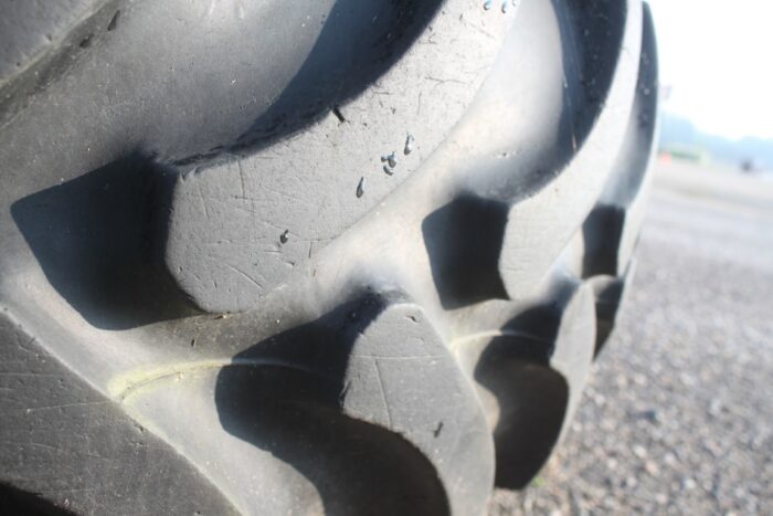 Firestone set of 2 16.9x24 tires on 8 bolt rims - Image 4