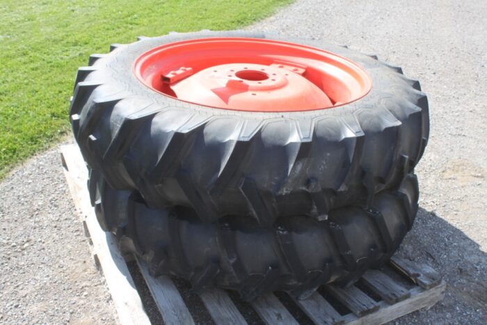 set of 13.6x 38 tires and wheel assemblies