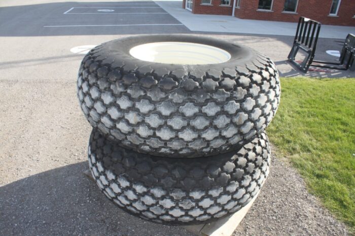 Firestone R-3 diamond tread, 24.5-32, 12 ply, tire and rims
