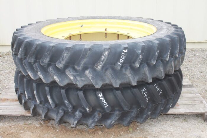 14.9R-46, rear main, JD yellow, rim size 13-46, fixed plate center hub, 16x35.5 bolt circle, pilot 29.5