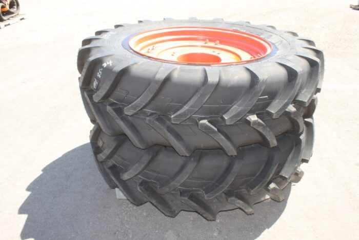 Michelin Pair of 420/85R34 tires on 8 bolt cast Kubota OEM rim, 100% tread, 6"pilot, 8" bolt circle, orange - Image 2