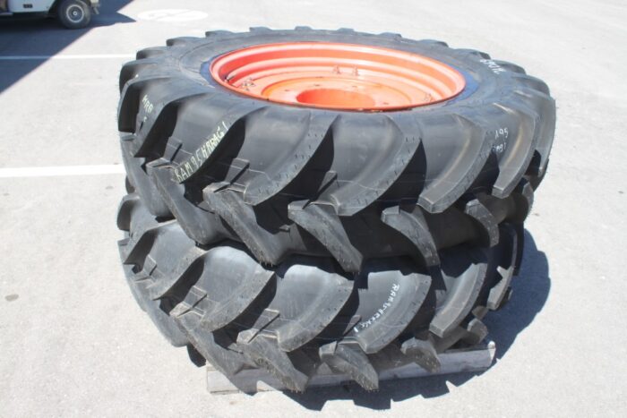 Michelin Pair of 420/85R34 tires on 8 bolt cast Kubota OEM rim, 100% tread, 6"pilot, 8" bolt circle, orange - Image 3