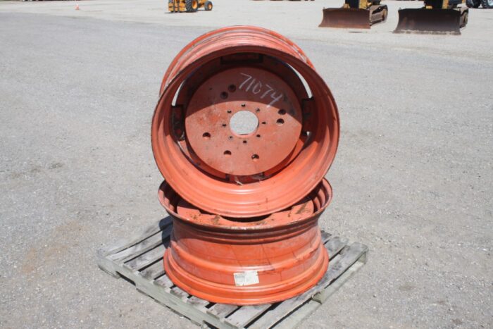 Michelin Pair of cast 15"X34" Kubota OEM rim, 6"pilot, 8" bolt circle, orange