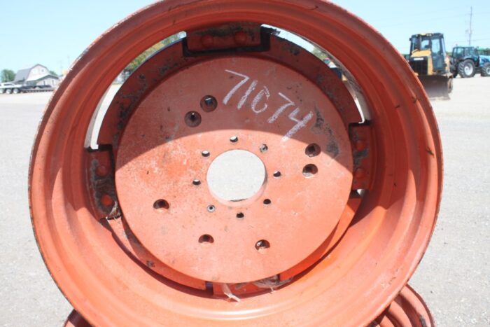 Michelin Pair of cast 15"X34" Kubota OEM rim, 6"pilot, 8" bolt circle, orange - Image 4