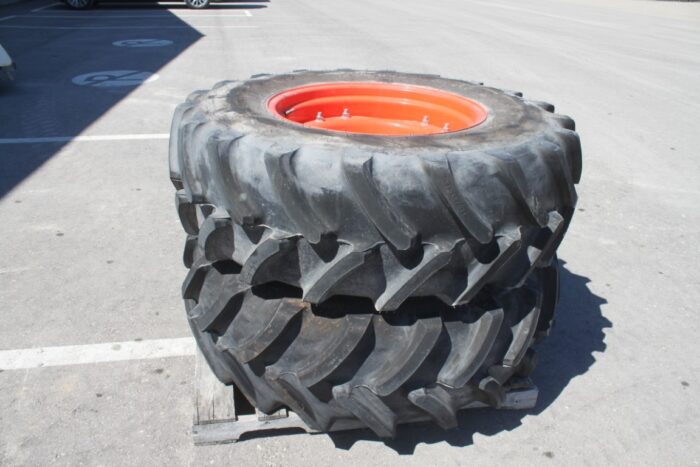 Firestone Pair of 420/85R28 tires on 10 bolt steel Kubota OEM rim, 100% tread, 11"pilot, 13" bolt circle, orange - Image 4