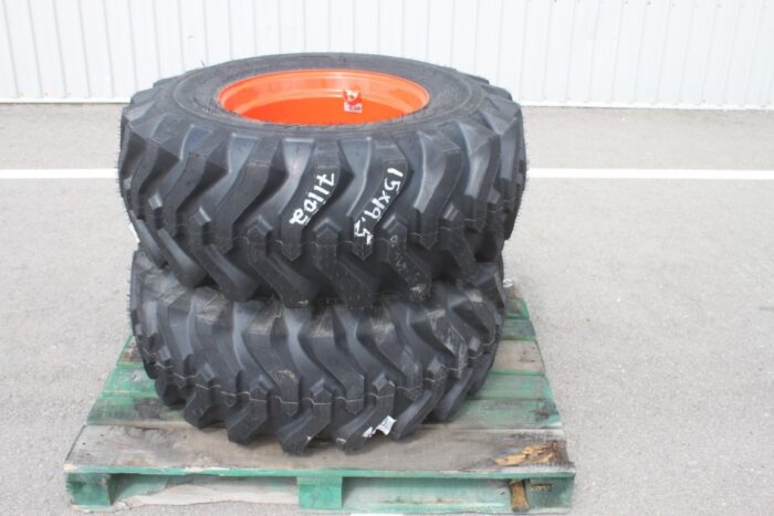 Titan pair of 15x19.5 on Kubota rim, 100% tread