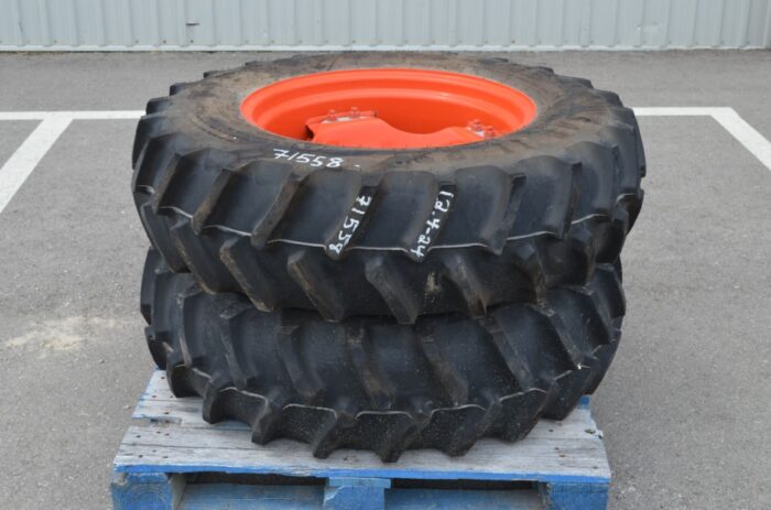 Firestone pair of 12.4-24 tires on Kubota rims