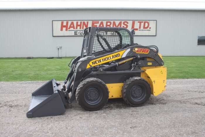 New Holland L218 skidsteer, rops, pilot controls, aux hyd, 895 hours, 2 speed, Shibura engine
