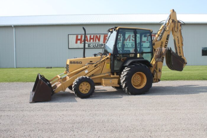 Ford 555D 4wd backhoe, extendahoe, cab, 87" front bucket, 23" ditching bucket, one owner, 2472 hours