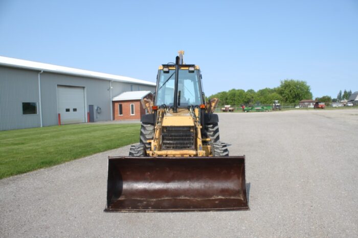 Ford 555D 4wd backhoe, extendahoe, cab, 87" front bucket, 23" ditching bucket, one owner, 2472 hours - Image 3