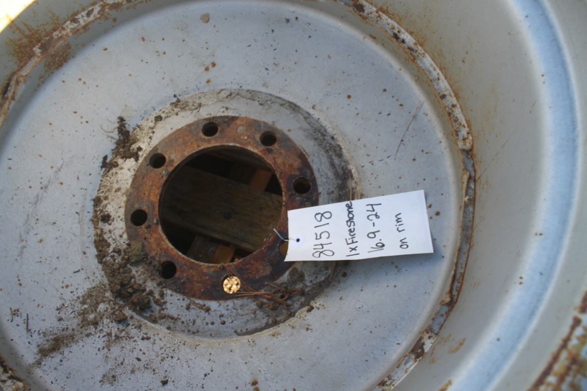 Firestone 1-16.9-24 tire on rim - Image 5